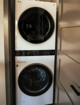 a washer dry in a closet of a cabin