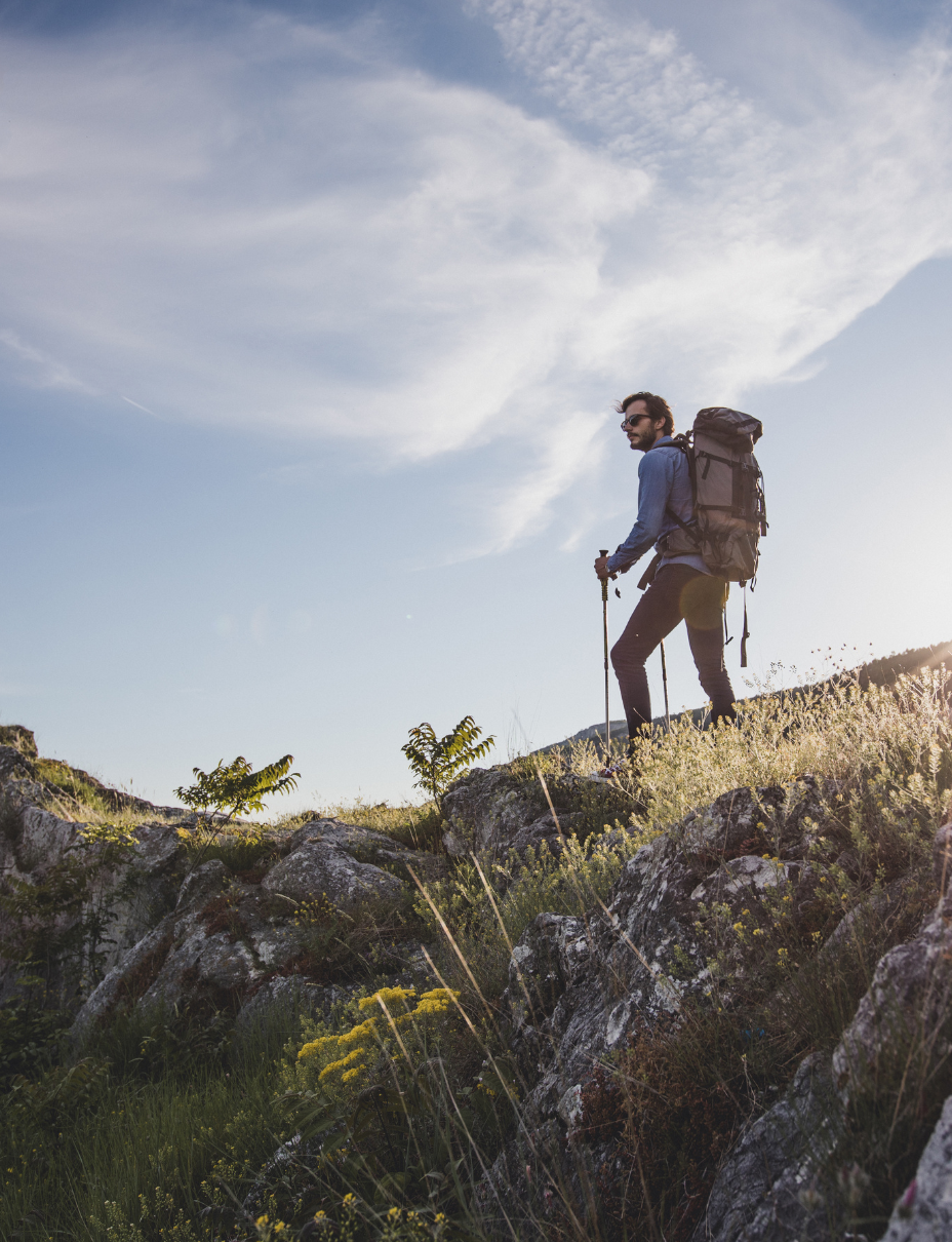 man hiking with a backpack