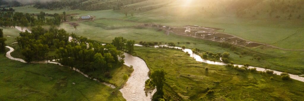 a guest ranch at sunset