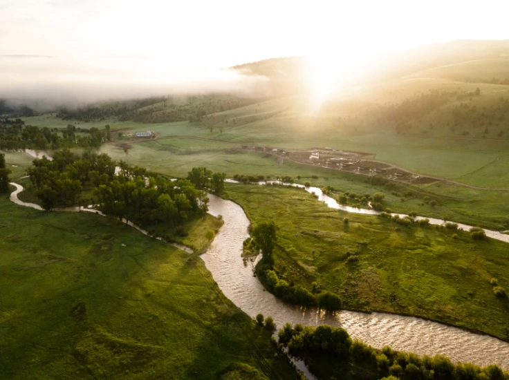 an aerial view of a guest ranch in montana