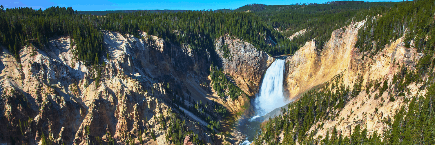 a dramatic waterfall in yellowstone national park