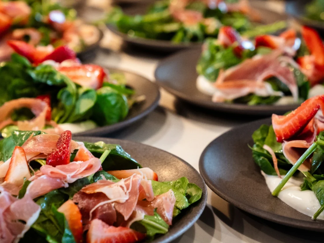 many salads sitting next to eachother